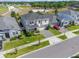 An aerial view of the home showcases its well-maintained landscaping and proximity to the community park at 10814 Whitland Grove Dr, Riverview, FL 33578