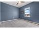 Bedroom featuring a window and ceiling fan at 10814 Whitland Grove Dr, Riverview, FL 33578