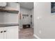 Inviting hallway features a convenient storage bench and custom built-in shelving at 10814 Whitland Grove Dr, Riverview, FL 33578