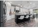 Bright kitchen boasts a central island with seating, stainless appliances, and ample counter space at 10814 Whitland Grove Dr, Riverview, FL 33578