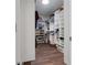 Spacious walk-in closet with custom shelving and ample storage solutions at 10814 Whitland Grove Dr, Riverview, FL 33578
