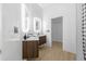 Stylish bathroom with sleek vanities, bright lighting, and neutral tile flooring for a clean look at 11611 Meridian Point Dr, Tampa, FL 33626