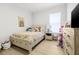 Charming bedroom with a cozy bed, rainbow tapestry, and toy furniture, perfect for  at 11611 Meridian Point Dr, Tampa, FL 33626