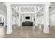 Spacious clubhouse featuring a fireplace, comfortable seating, and soaring ceilings for gatherings at 11611 Meridian Point Dr, Tampa, FL 33626
