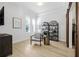 Bright room featuring a chair, unique bookcase, wood floors and barn doors at 11611 Meridian Point Dr, Tampa, FL 33626