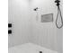 Modern shower with sleek black fixtures and contemporary tiling at 11611 Meridian Point Dr, Tampa, FL 33626