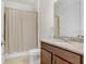 Clean bathroom with granite vanity and shower-tub combination at 1214 Florablu Dr, Seffner, FL 33584