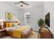 Stylish bedroom featuring ample natural light, neutral color palettes, and a comfortable queen size bed at 1214 Florablu Dr, Seffner, FL 33584