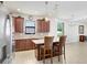 Well-appointed kitchen with modern cabinets, stainless appliances, and center island at 1214 Florablu Dr, Seffner, FL 33584