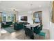 Bright open-concept living room and dining area enhanced by stylish decor and abundant natural light at 1214 Florablu Dr, Seffner, FL 33584