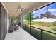 Enjoy this serene, screened-in patio overlooking the backyard, perfect for relaxing outdoors at 1214 Florablu Dr, Seffner, FL 33584