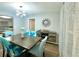 Open dining room with modern decor, stylish furniture and a large window at 12432 81St Ct, Seminole, FL 33772