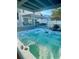 Inviting hot tub with clear, bubbling water, perfect for relaxation and outdoor entertainment at 12432 81St Ct, Seminole, FL 33772