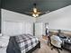 Bedroom featuring a dark gray ceiling, carpeted floor, and desk at 1292 Myers Rd, Brooksville, FL 34602
