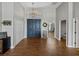 Grand foyer with chandelier, tile floors, and double doors, creating a welcoming entrance to the home at 1292 Myers Rd, Brooksville, FL 34602