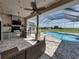 Outdoor kitchen with built in barbecue by the pool at 1292 Myers Rd, Brooksville, FL 34602