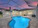 Inviting screened pool with expansive patio, perfect for outdoor entertaining during sunset at 1292 Myers Rd, Brooksville, FL 34602