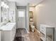 The bathroom features a vanity and access to the backyard at 13806 Sumac Pl, Tampa, FL 33625