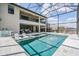 Beautiful backyard pool and patio area perfect for outdoor entertaining and relaxation at 14507 Woodland Spur Dr, Lithia, FL 33547