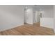Spacious bonus room featuring laminate floors and ample natural light at 16030 Bella Woods Dr, Tampa, FL 33647