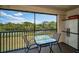 Relaxing balcony offering a peaceful river view, perfect for outdoor dining and enjoying nature at 1686 Seascape Cir, Tarpon Springs, FL 34689