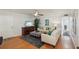 Bright living room with neutral colors, hardwood floors, and contemporary furnishings, creating a welcoming atmosphere at 1705 Belleair Forest Dr # B, Belleair, FL 33756