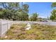 Spacious fenced-in backyard needing clean-up and has potential for outdoor activities at 1778 27Th N Ave, St Petersburg, FL 33713
