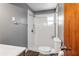 Bathroom with a shower, toilet, and towel rack at 1778 27Th N Ave, St Petersburg, FL 33713