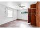 Bedroom with a ceiling fan, two windows and a closet at 1778 27Th N Ave, St Petersburg, FL 33713