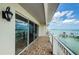 Spacious balcony with marina views, perfect for enjoying coastal breezes at 1860 N Fort Harrison Ave # 106, Clearwater, FL 33755