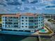 Stunning waterfront condo with a private pool and multiple balconies overlooking the water at 1860 N Fort Harrison Ave # 106, Clearwater, FL 33755