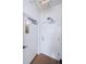 Hallway with two white doors, including one with a window and the other with a unit number '106' at 1860 N Fort Harrison Ave # 106, Clearwater, FL 33755