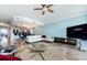 Spacious living room featuring an open floor plan and stylish decor at 1860 N Fort Harrison Ave # 106, Clearwater, FL 33755