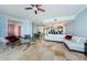 Open concept living space with marble floors and modern furnishings at 1860 N Fort Harrison Ave # 106, Clearwater, FL 33755
