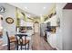 Well-lit kitchen featuring stainless steel appliances, granite countertops, and eat-in island at 19750 Ellendale Dr, Land O Lakes, FL 34638