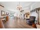 Bright living room showcasing hardwood floors and an open floor plan at 19750 Ellendale Dr, Land O Lakes, FL 34638