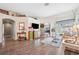 Bright living room showcasing hardwood floors and an open floor plan at 19750 Ellendale Dr, Land O Lakes, FL 34638