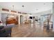 Bright living room showcasing hardwood floors and an open floor plan at 19750 Ellendale Dr, Land O Lakes, FL 34638