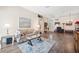 Bright living room showcasing hardwood floors and an open floor plan at 19750 Ellendale Dr, Land O Lakes, FL 34638