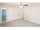 Bedroom with spacious closet and views into attached bathroom, featuring clean lines at 2207 Valleybrook Ave, Valrico, FL 33594