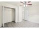 Bedroom featuring spacious closet and views into another room, blending functionality at 2207 Valleybrook Ave, Valrico, FL 33594
