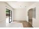 Bright dining area featuring wood-look flooring and access to a large sliding glass door to the back yard at 2207 Valleybrook Ave, Valrico, FL 33594