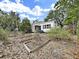 Backyard showcasing raised garden beds, ready for planting and creating your own personal oasis at 235 38Th S St, St Petersburg, FL 33711