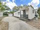Charming single-story home with a well-maintained yard and detached garage at 235 38Th S St, St Petersburg, FL 33711