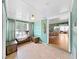 Inviting sunroom with natural light, tiled floor, and connection to the living area at 235 38Th S St, St Petersburg, FL 33711