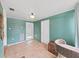 Sunroom featuring tile flooring, cozy decor, and natural light filtering through the windows at 235 38Th S St, St Petersburg, FL 33711