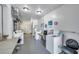 Well-lit laundry room with multiple washers and dryers for community convenience at 2452 Brazilia Dr # 32, Clearwater, FL 33763