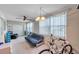 Living room featuring a ceiling fan and filled with furniture, including a sofa and seating area at 2452 Brazilia Dr # 32, Clearwater, FL 33763