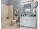 Bathroom with tub and shower combo and updated vanity at 30340 Elderwood Dr, Wesley Chapel, FL 33543