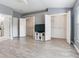 Large bedroom with multiple closets and hardwood flooring throughout at 30340 Elderwood Dr, Wesley Chapel, FL 33543
